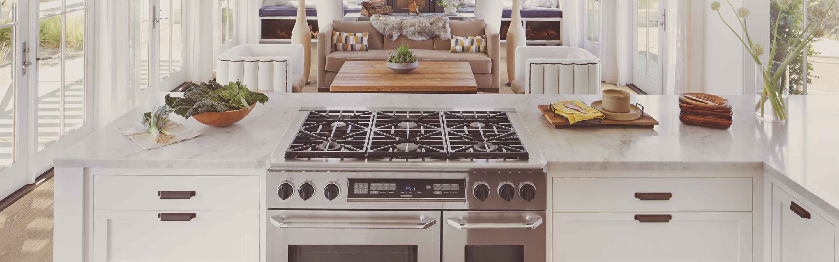 White countertop in a kitchen with stainless steel oven