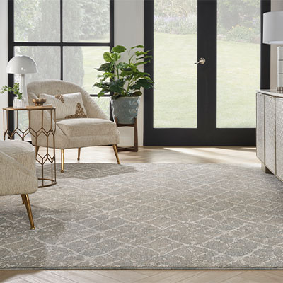 Blue and grey patterned carpet in living room.