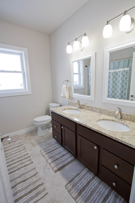 tile floor with rugs