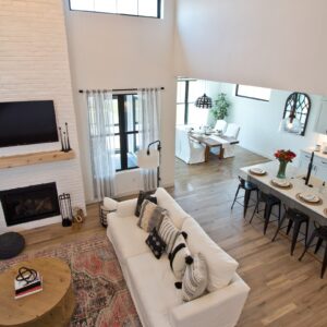 View of the great room into the kitchen and dining room