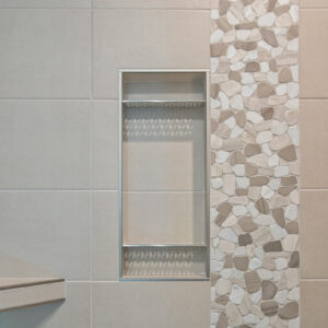 Schluter Shower System Floral Shelves with Emser Cultura Pebbles