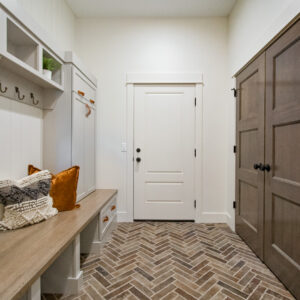 mudroom floor tile in herringbone pattern