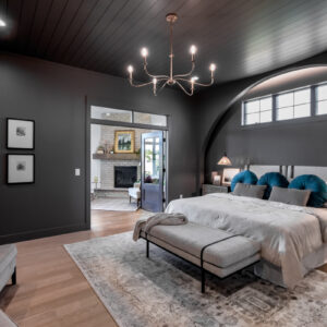 primary bedroom suite with hickory wood floors