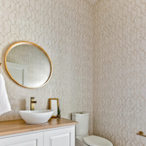 classic contemporary powder room with wood floors