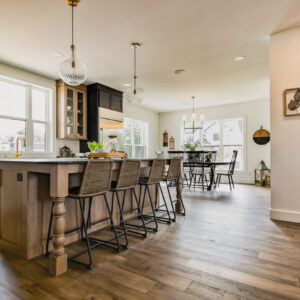 shiloh cabinetry kitchen island, color clay on quarter sawn white oak