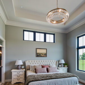 transitional french tudor primary bedroom design