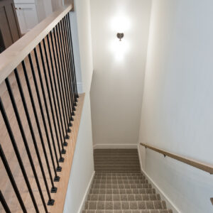 transitional boho staircase carpet to lower level by nourison, pacific stripe in gray stone