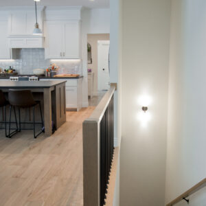 Transitonal Boho main living area and carpeted staircase