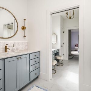 vanity by aspect cabinetry in stardew on maple. backsplash tile by lungarno, melody 5x5, audry deco in easton white