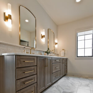 Classic Elegance Design, Modern bathroom with natural wood vanity, white quartz countertop, and 12x24 marble-look Daltile Perpetuo tile in Brilliant White