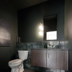 modern transitional elegance Stylish powder room featuring Equipe Artisan 5x5 moss green wall tile and French Gray grout for a classic look